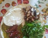 A picture of step 3 of Piadina with Octopus, Burrata, Pesto, Sun-Dried Tomatoes & Arugula.