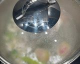 A picture of step 4 of Cook every part - Chicken broth (with some meat) from chicken back/carcass, and wing tips.
