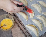 Foto del paso 9 de la receta: Empanadillas de sepia y patata al horno