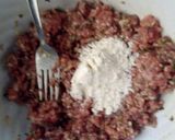 A picture of step 4 of Meat balls and beef sausages bitings in sauce.
