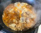 A picture of step 4 of Chicken and Eggs Bowl (Oyakodon).