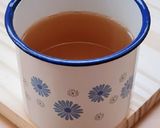 Foto del paso 4 de la receta: Infusión reconfortante de cúrcuma y jengibre (frescos) 🧡 🍵