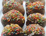 A picture of step 1 of Chocolate cookies partly covered in Sprinkles.