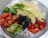 A picture of step 1 of Spicy Papaya Salad with Fermented Crab.