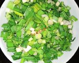 A picture of step 3 of Jowar Roti with Green Garlic.