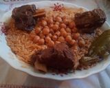 صورة لخطوة 4 من وصفة أرز بالمرق الاحمر