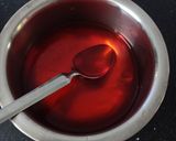 A picture of step 2 of Tangy Orange popsicles.
