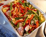 A picture of step 2 of Oven-Baked Chicken with Bell Peppers and Sweet Potatoes.
