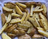 Foto del paso 4 de la receta: Cascos de papa a las finas hierbas