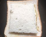 A picture of step 7 of Cheesy Egg Toast.