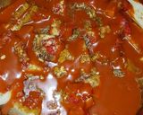 A picture of step 3 of Yam porridge garnished with mint leaf for coolness.