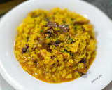 Foto del paso 8 de la receta: Arroz meloso de pota al ajillo con alga dulce