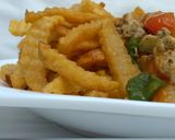A picture of step 11 of Egg liver sauce with chips.