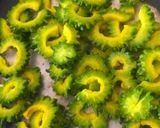 A picture of step 2 of Stir fry karela.