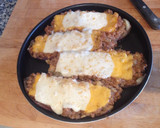 Foto del paso 10 de la receta: Berenjenas rellenas de carne en microondas con grill