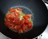 A picture of step 2 of Brinjal karahi.