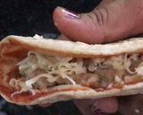 A picture of step 4 of Mexican taco In Indian style.