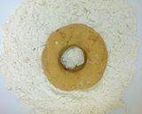 A picture of step 14 of Yam Donuts.