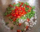Foto del paso 4 de la receta: Arroz frito con pollo