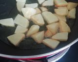 A picture of step 2 of Capsicum, Fry potato and Tomato Subji.