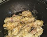 A picture of step 2 of Garlic chicken wings with chineese rice.