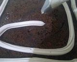 A picture of step 13 of Chocolate Pastry with Ceremal/ Chocolate Ganache Frosting.