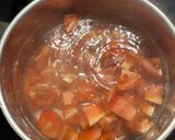 A picture of step 2 of Tomato and Lettuce Zōsui (Japanese Rice Porridge).