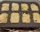 A picture of step 10 of Angel Hair Alfredo "Cakes" with Marinara Sauce and Sausage.