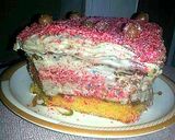 A picture of step 7 of 4 layer vanilla red cake.