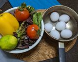 A picture of step 1 of Egg, Bell Pepper, and Tomato Vegetable Salad.