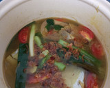 Foto langkah ke 4 dari resep Sup/pindang ikan patin bumbu iris.