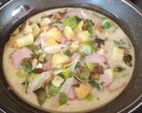 A picture of step 3 of Oven-Baked Potato Omelette Stuffed with Ham and Cheese.