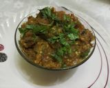 A picture of step 12 of Baingan bharta (smoked eggplant with spices).