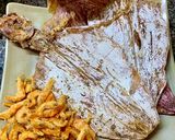 A picture of step 1 of Dried Squid Congee.