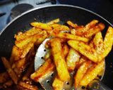 A picture of step 7 of Spicy finger chips.