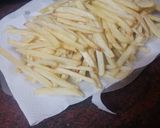 Foto del paso 2 de la receta: Chuletas de cerdo a la sartén con papas fritas