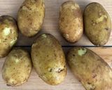 A picture of step 1 of New potatoes with wild garlic.
