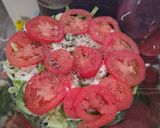 A picture of step 2 of 7 layer Salad.