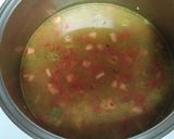 A picture of step 4 of Jamerican Curry Chicken & Rice Soup.