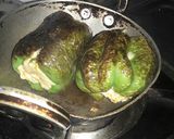 A picture of step 4 of Cheesy Stuffed capsicum fry.