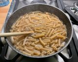 Une image de l'étape 5 de Macaronis complets au roquefort et lomo fumé.