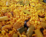 Foto del paso 7 de la receta: Arroz con pulpo y ajetes
