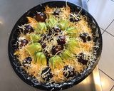 Une image de l'étape 8 de Fleurs de courgettes farcies aux crevettes tomates cerises noires et deux fromages.
