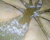 A picture of step 5 of Triangle shaped stuffed bread.