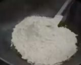 A picture of step 2 of Oats almonds sukhdi.