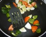 A picture of step 3 of Spicy Honey-Yogurt Mutton Kababs with sautéed veggies.