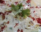 A picture of step 11 of Punjabi thali (Tandoori roti with dal makhni kheere ka raita and chutney).