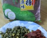 A picture of step 1 of Healthy Tea Drink ~ Chrysanthemum, Goji Berry, and Winter Melon Tea.