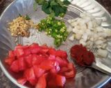A picture of step 2 of Double tadka lahsuni Urad Dal.