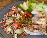 A picture of step 2 of Summer salad - spelt, coriander, tomato, artichoke, dried tomato, red onion, cucumber, paprika, feta.